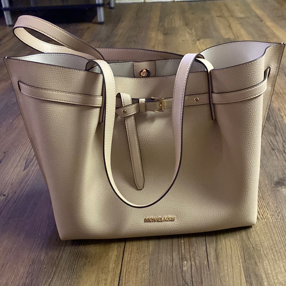 Michael Kors Soft Pink Tote Handbag with gold accents.